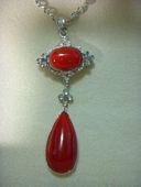Natural red aka coral and diamond pendant 