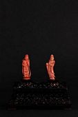 A pair of natural orange red coral Guanyin carving 